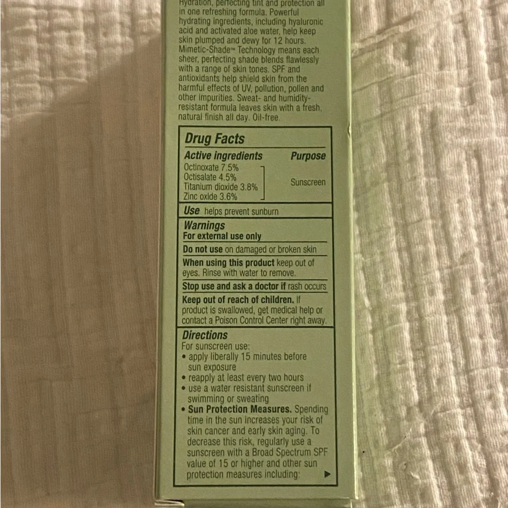 Clinique Moisture Surge Sheertint Hydrator Broad Spectrum SPF 25 Universal Deep